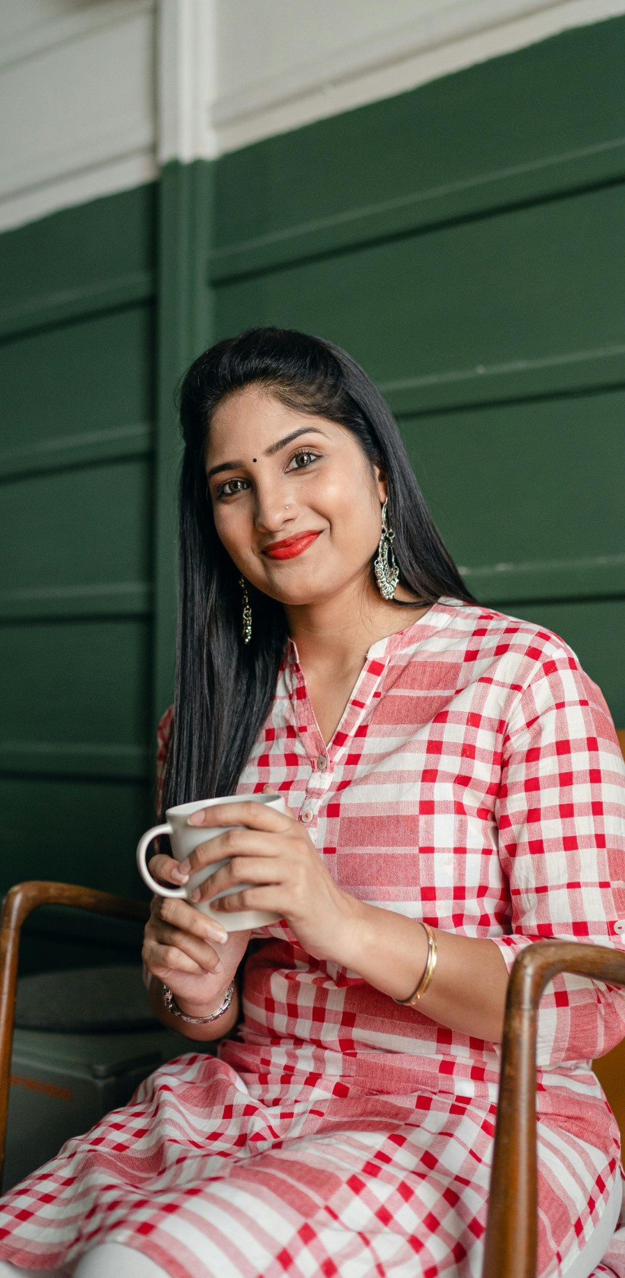 Woman holding cup